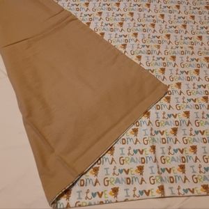 I Love Grandma Print Flannel Blanket with tan backing.